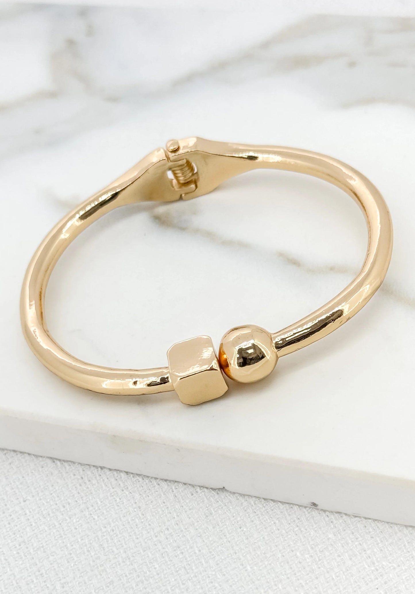 Envy Gold Tone Hinged Bangle
